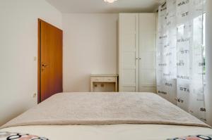 Posteľ alebo postele v izbe v ubytovaní Apartment Sun & Sea