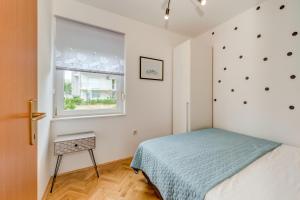 Posteľ alebo postele v izbe v ubytovaní Apartment Sun & Sea