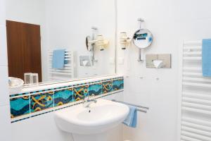 Koupelna v ubytování Aparthotel Kachelot