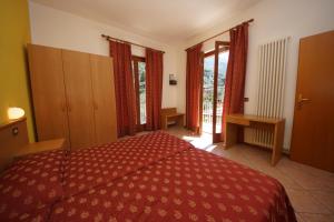 Katil atau katil-katil dalam bilik di Hotel Alpi