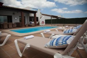 Bazén v ubytování VILLA DREAMS - VILLAS LA ESTANCIA - nebo v jeho okolí