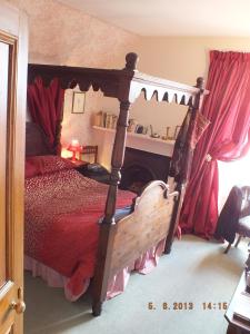 Postel nebo postele na pokoji v ubytování Greystones B&B