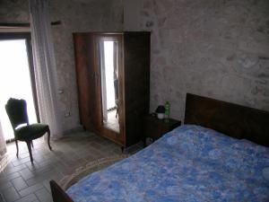 Postel nebo postele na pokoji v ubytování Masseria del Ponte