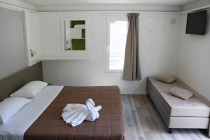 hu Venezia Camping in Town客房内的一张或多张床位
