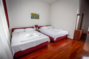 Ένα ή περισσότερα κρεβάτια σε δωμάτιο στο Hotel BOB
