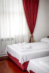 Ένα ή περισσότερα κρεβάτια σε δωμάτιο στο Hotel BOB