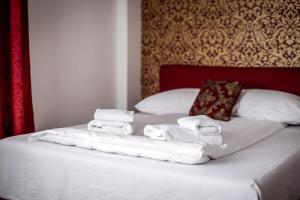 Ένα ή περισσότερα κρεβάτια σε δωμάτιο στο Hotel BOB