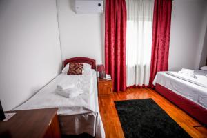 Postel nebo postele na pokoji v ubytování Hotel BOB