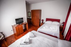 Ένα ή περισσότερα κρεβάτια σε δωμάτιο στο Hotel BOB