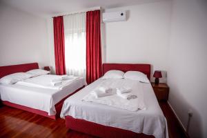 Ένα ή περισσότερα κρεβάτια σε δωμάτιο στο Hotel BOB