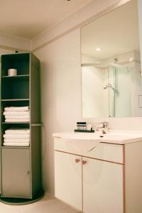 Ett badrum på Stavanger Small Apartments - City Centre