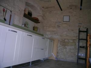 Kuchyň nebo kuchyňský kout v ubytování Masseria del Ponte