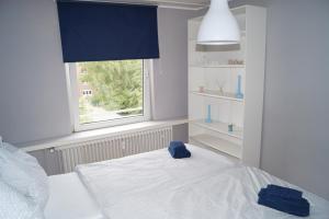 Säng eller sängar i ett rum på Apartment Krefeld City