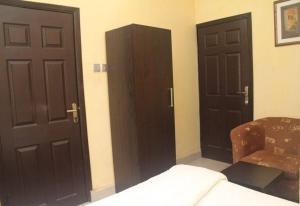 Ένα ή περισσότερα κρεβάτια σε δωμάτιο στο Chantella Suites