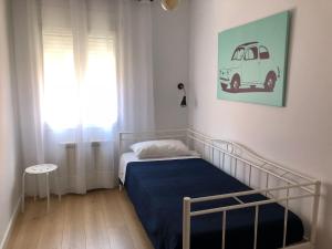 Postel nebo postele na pokoji v ubytování Caputxins Apartment