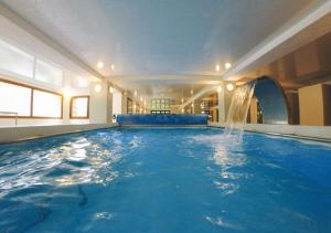 Bazén v ubytování Hotel Caldas nebo v jeho okolí