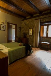 Postel nebo postele na pokoji v ubytování Hotel Caldas