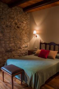Postel nebo postele na pokoji v ubytování Hotel Caldas