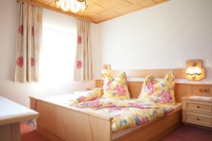 Łóżko lub łóżka w pokoju w obiekcie Eggerhof - Ferienhaus
