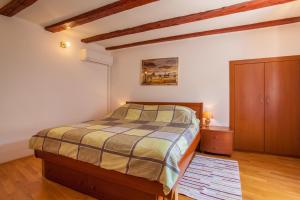 Un pat sau paturi într-o cameră la Apartment Rialto
