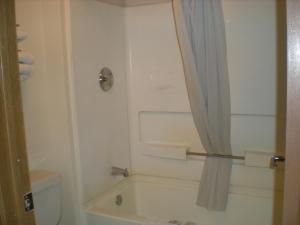 Ванная комната в Travelers Inn - Phoenix