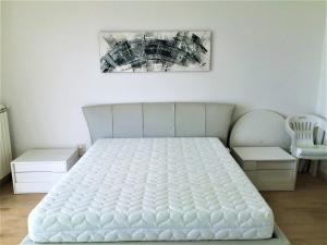 En eller flere senge i et værelse på Villa sul Mare