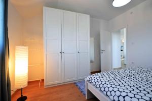 Voodi või voodid majutusasutuse Apartments Enida toas