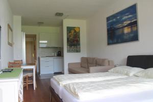 Postel nebo postele na pokoji v ubytování Ferienwohnung im Haus Landskron