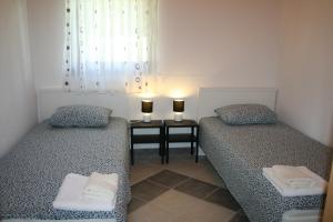 Posteľ alebo postele v izbe v ubytovaní Guesthouse Hodak