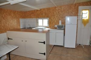 Kuchyň nebo kuchyňský kout v ubytování Mobil-home 221 Sigean + 1 fotografie