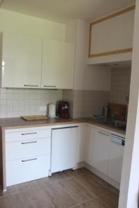 Kuchyň nebo kuchyňský kout v ubytování Ferienwohnung im Haus Landskron