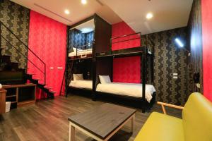 Postel nebo postele na pokoji v ubytování Place‧X Hotel