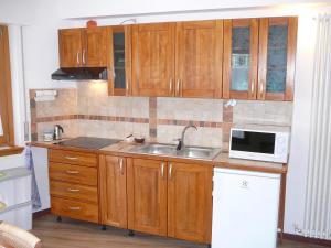 Kuchyň nebo kuchyňský kout v ubytování Casa Screm - Appartamenti e Camere -Rigolato - UD