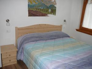 Postel nebo postele na pokoji v ubytování Casa Screm - Appartamenti e Camere -Rigolato - UD