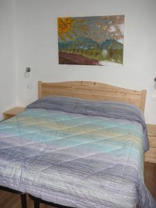 Postel nebo postele na pokoji v ubytování Casa Screm - Appartamenti e Camere -Rigolato - UD