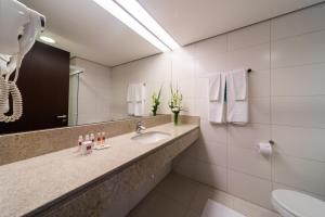 Um banheiro em Hotel Panamby São Paulo
