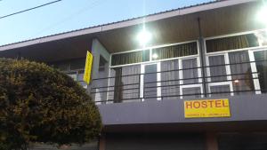 a building with a hospital sign on the side of it at gostevoi dom in Zugdidi
