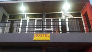 a building with a hostel sign on top of it at gostevoi dom in Zugdidi