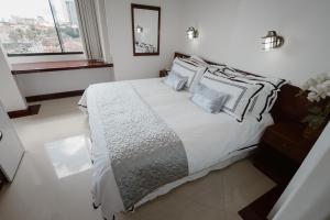 Postel nebo postele na pokoji v ubytování Hotel Arenal
