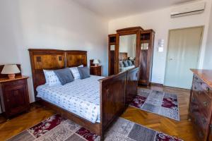 Posteľ alebo postele v izbe v ubytovaní Gianduja B&B