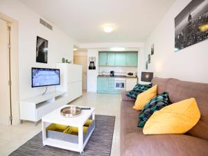 a living room with a couch and a table at Apartment Amatista-7 by Interhome in Calpe
