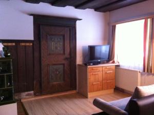 Telewizja i/lub zestaw kina domowego w obiekcie Reitbauernhof Schartner