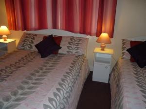 Postel nebo postele na pokoji v ubytování Armcashel B&B