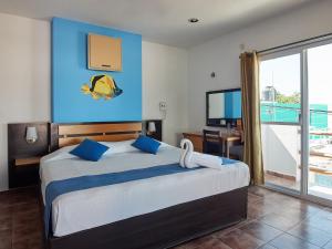 Postel nebo postele na pokoji v ubytování Hotel Tabasco Rio