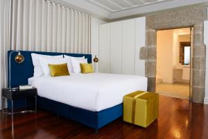 Uma cama ou camas num quarto em Convento do Seixo Boutique Hotel & Spa