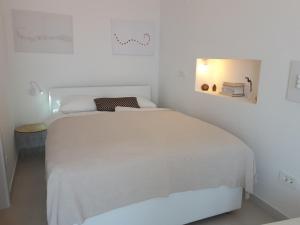 Posteľ alebo postele v izbe v ubytovaní Alto Rooms and Apartments