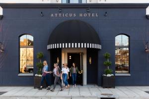 people standing outside of a building at Atticus Hotel in McMinnville