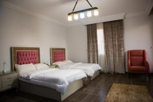 Postel nebo postele na pokoji v ubytování Hayat Pyramids View Hotel
