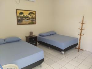 Porto dos Lencóis - Chalé Tipo Apartamento客房内的一张或多张床位