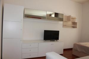 Et tv og/eller underholdning på Nel Sole appartamenti